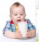 cute-little-boy-going-to-drink-milk-glass-19176698.jpg